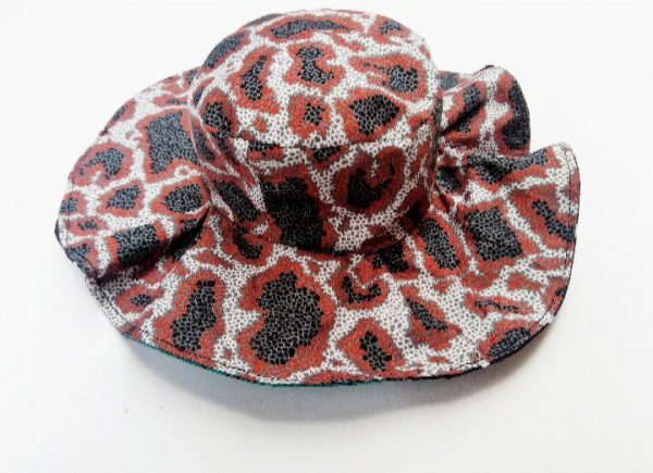 A reversible wide brim bucket hat made with ankara fabric perfect for the summer.
