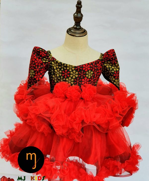This gorgeous red Ifede dress will make your little one look like a precious gift this valentine season. With a pointy tip puff sleeve and a fluffy ruffled skirt.